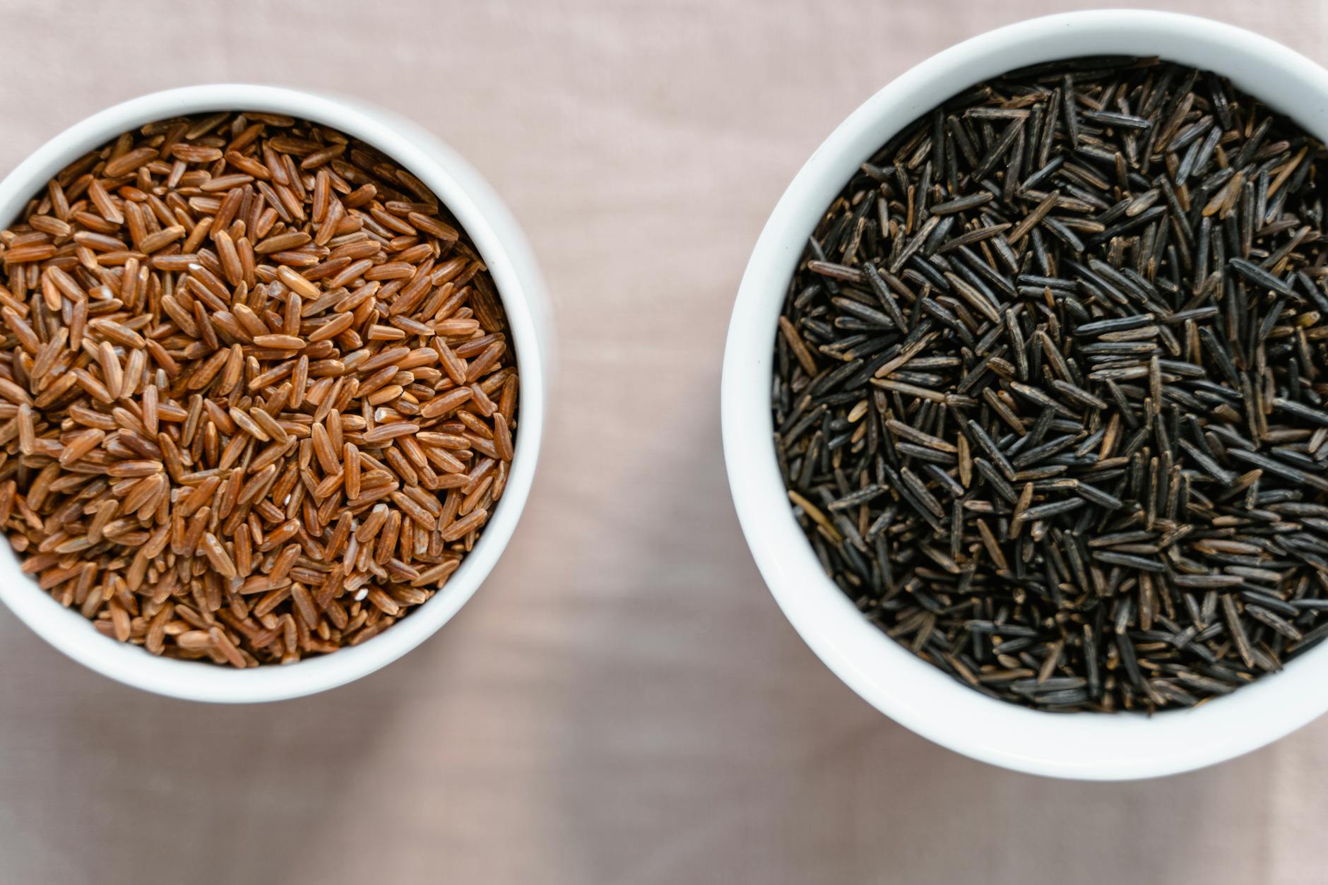 dried grains in ceramic bowls
